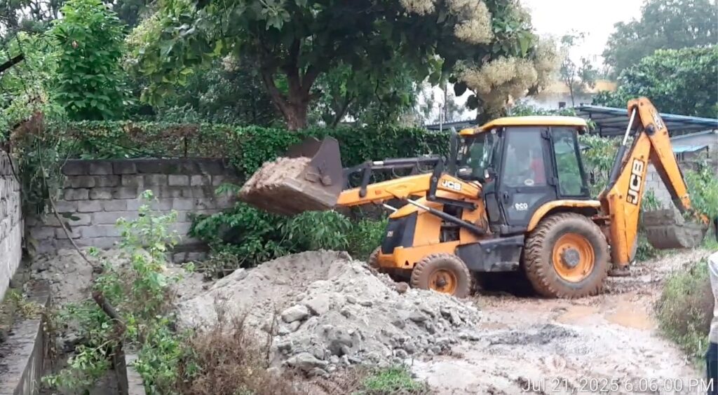 Screenshot of a JCB at work at Whitefield.